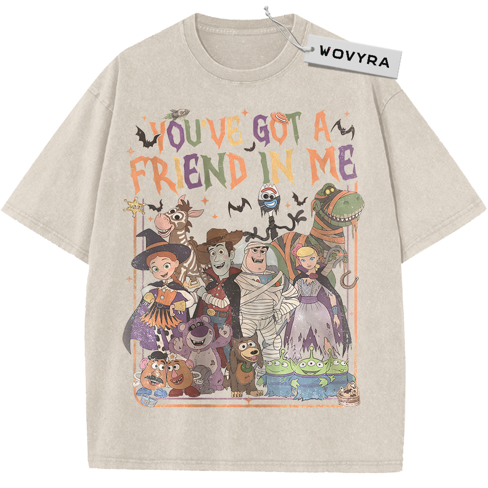 Vintage T-shirt featuring a Toy Story character group in Halloween costumes beneath colorful lettering