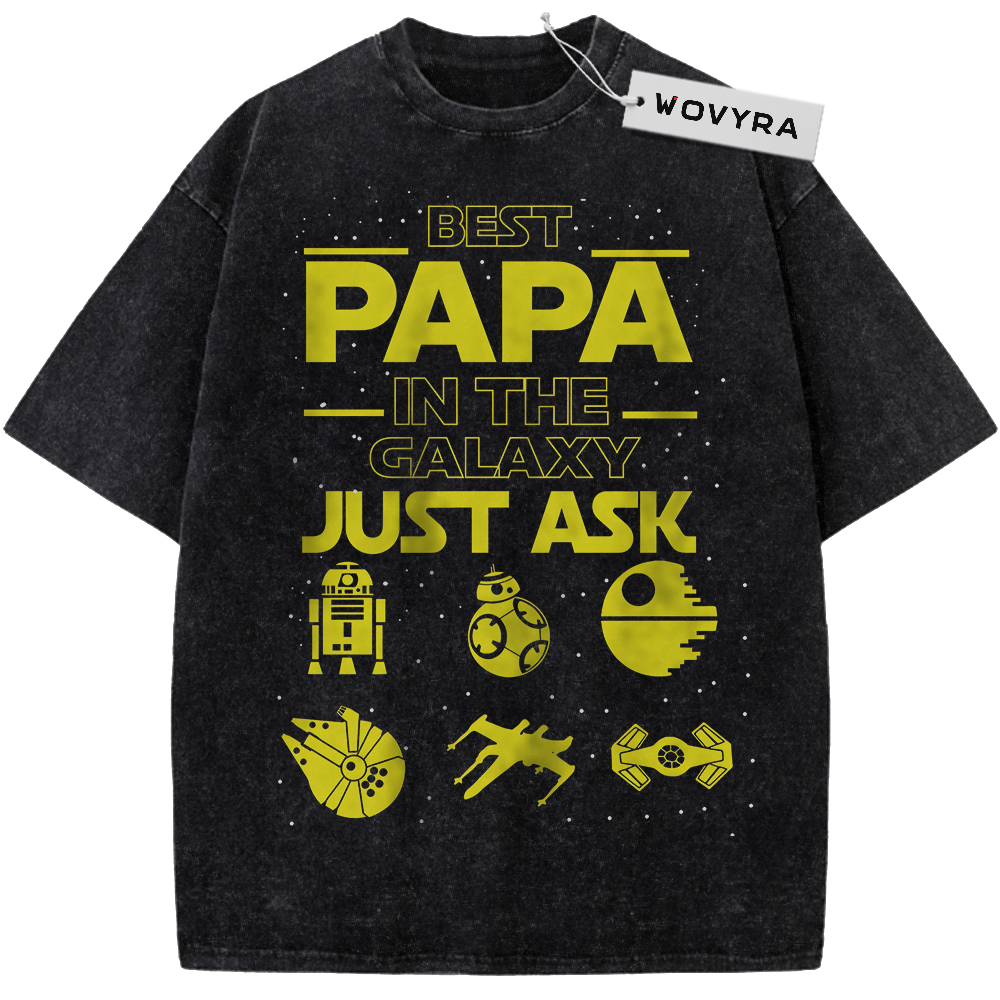 Vintage T-shirt featuring yellow Best Papa in the Galaxy lettering above small spacecraft and droid symbols