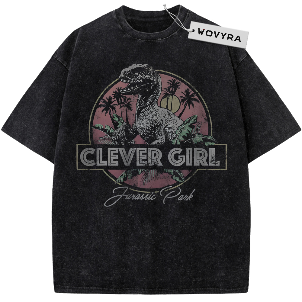 Vintage T-shirt featuring a dinosaur within a circular tropical scene and Clever Girl lettering